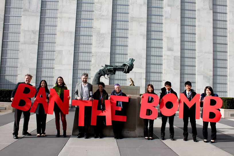 campaigners hold huge red letters ban the bomb