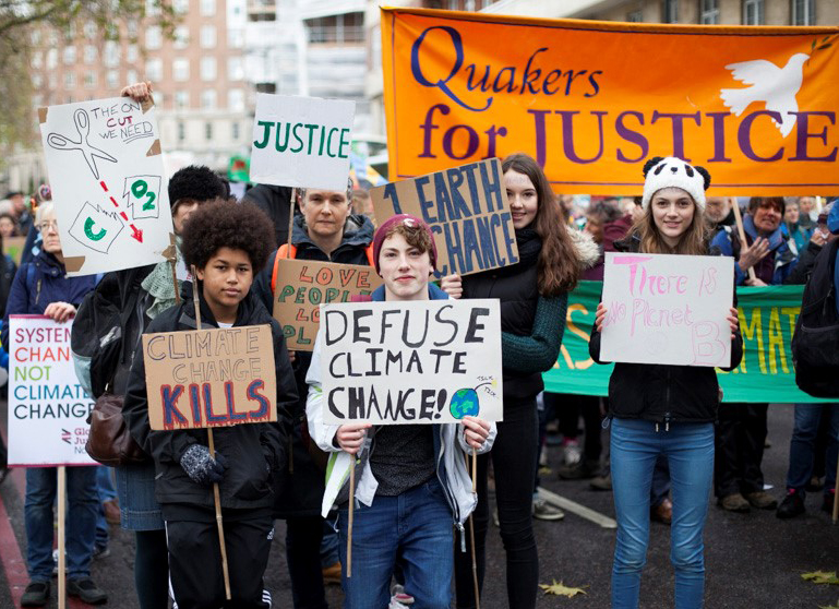 Young Quakers with banners