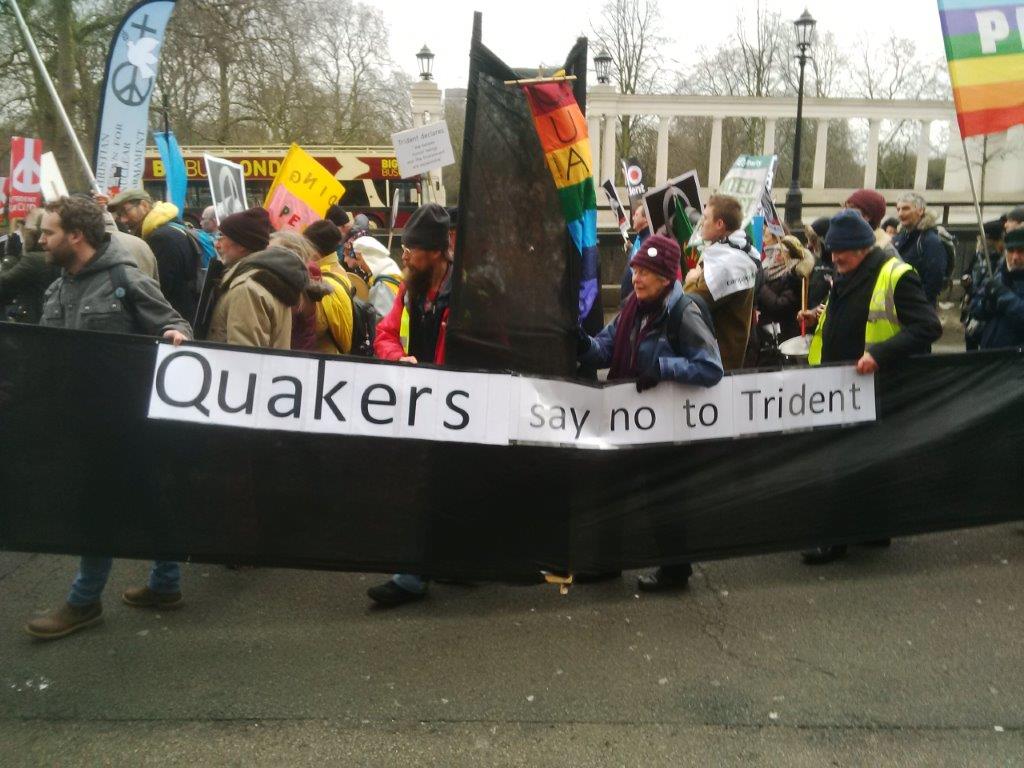 Picture shows Leeds Quakers among demo with 20 ft long cardboard submarine