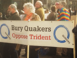 Quakers holding the "Bury Quakers oppose Trident" banner during their silent vigil. Phot credit: Jill Segger