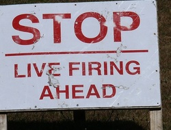 "STOP Life firing ahead" reads a sign on a rifle range used by cadets in Northumbria.