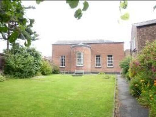 The meeting house is of simple elegant appearance provide a green space and a burial ground.