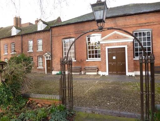 Earlu eighteenth century building constructed in local brick with classical details.