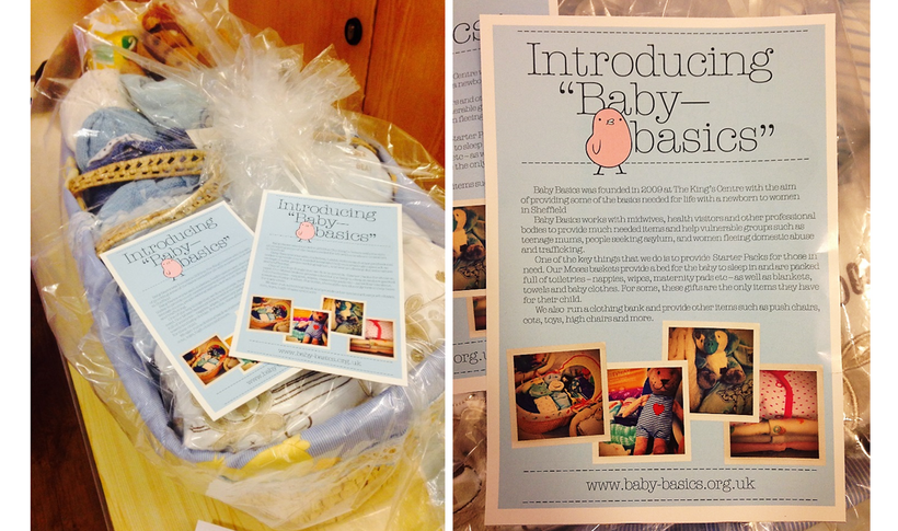 A Moses basket filled with items for children and a copy of a leaflet about 'Baby Basics'