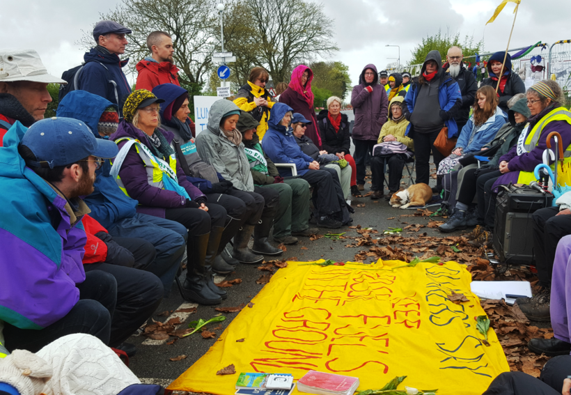 Quakers lead a meeting for worship outside the gates of the Lancashire fracking site. Photo: BYM