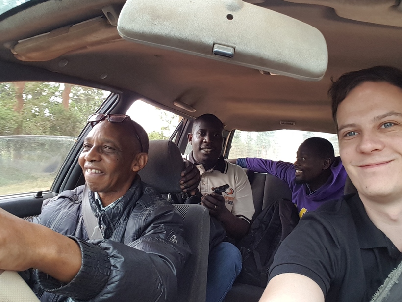 On the way to Gicumbi, Rwanda. Roads there are bumpy, but when you share the car with Rwandan peace activists, it’s surely not boring. Sezeli, a peace campaigner and genocide survivor, is driving. Photo: Tobias Wellner