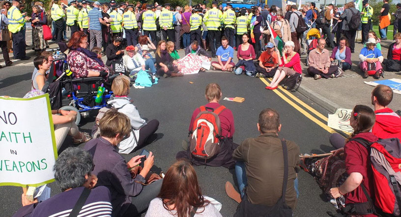 50 protesters seated in road in mfw 
