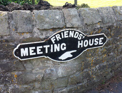 A white sign reads Quaker meeting house