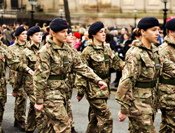 Challenging armed forces visits to schools