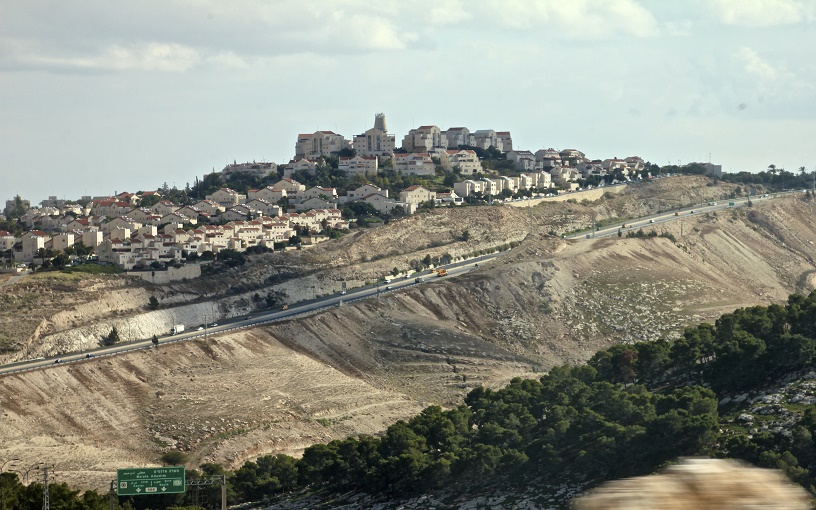 hilltop settlement, massive barrier wall, olive groves