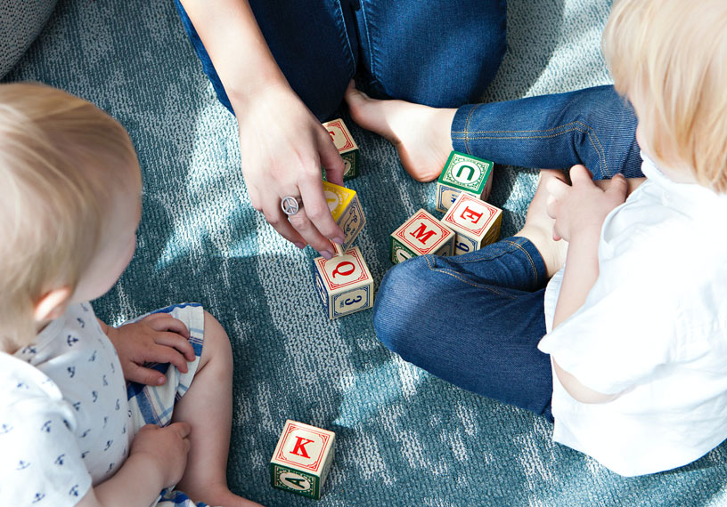 small children playing with blocks