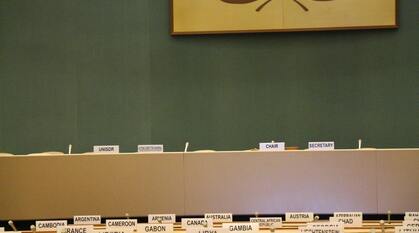 seats at the UN with country labels on