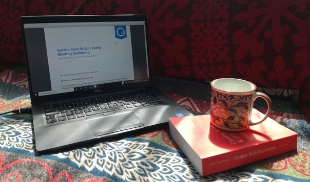 red Qf&p and epistle on laptop