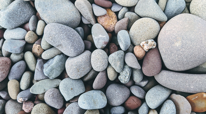 different coloured pebbles on a beach