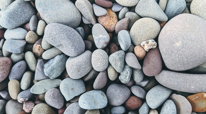 different coloured pebbles on a beach