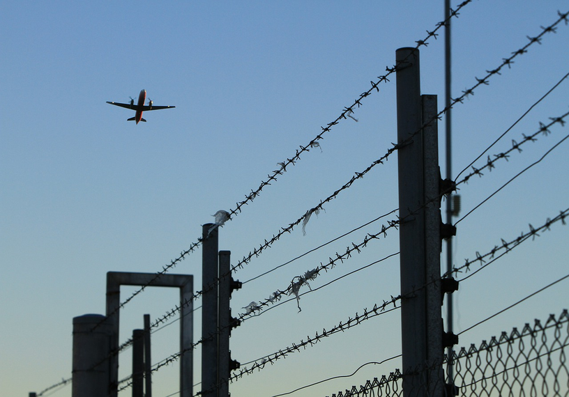 aircraft over barbed wire