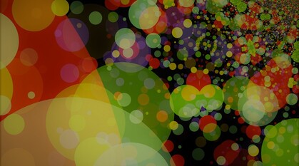 abstract image of circles in mainly red yellow and green on a black background