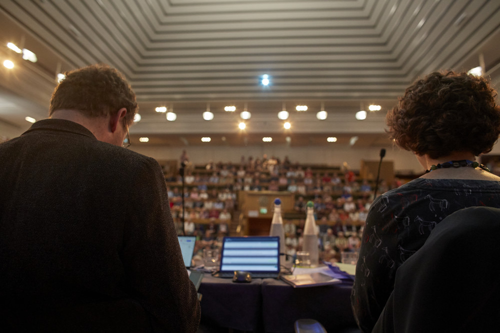 image of clerks table looking out over the large meeting house at yearly meeting in session