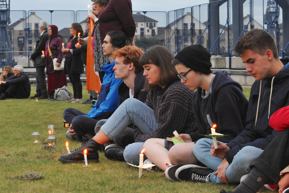 A vigil held at a previous DSEI