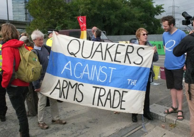 Banner reading Quakers against the arms trade