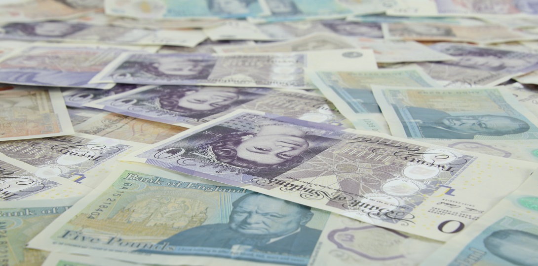 A scattering of British bank notes