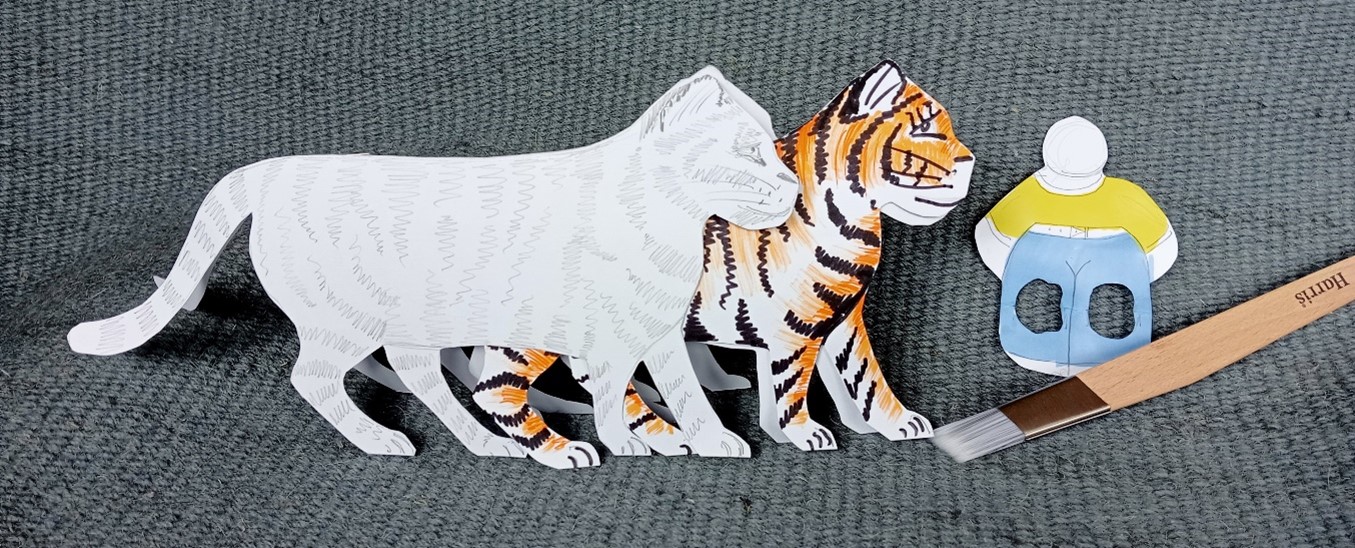 2 cut out images of tigers, one with coloured stripes, one white with a paintbrush