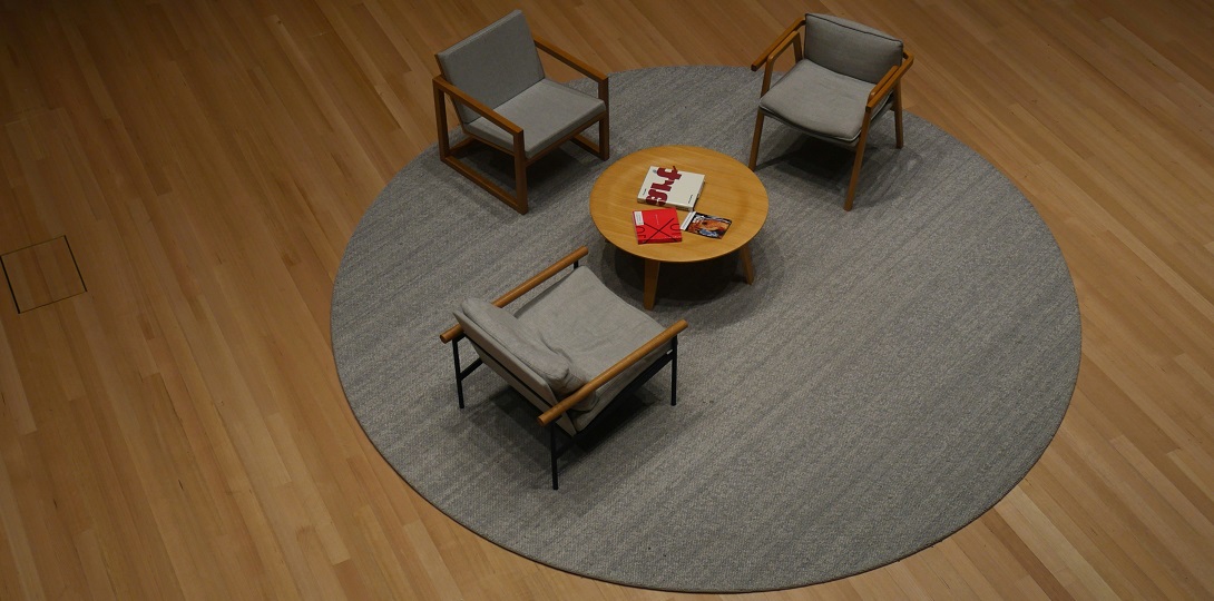 three empty chairs facing each other