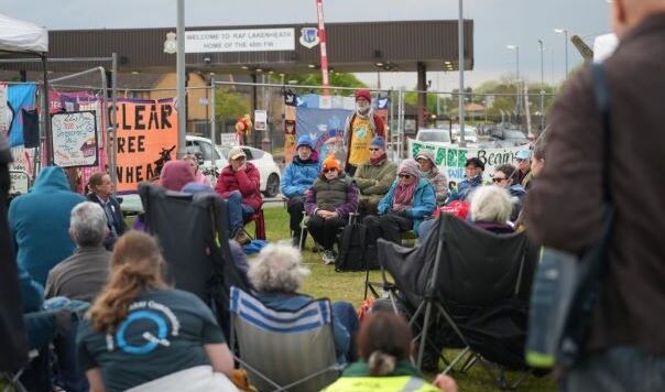 People in Quaker meeting in front of RAF Lakenheath gate