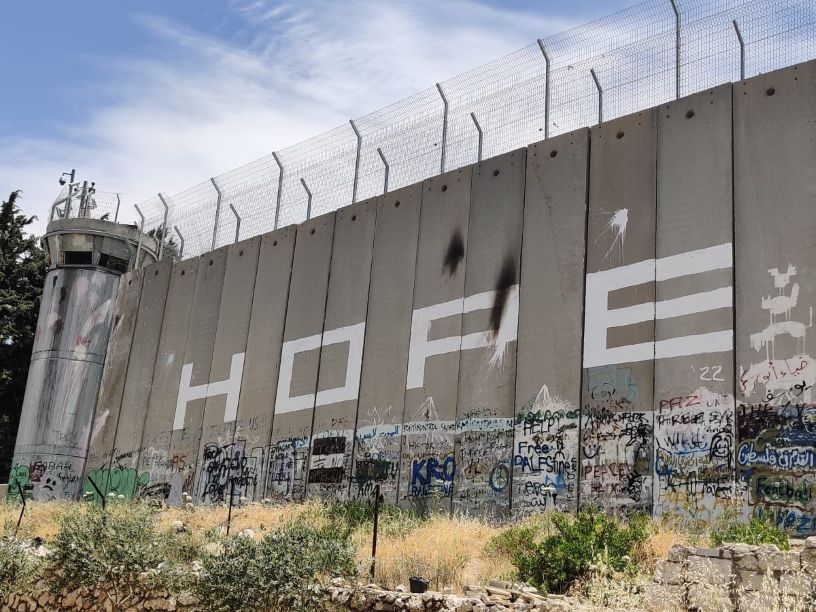 Huge concrete wall with HOPE written on it